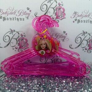 12 Barbie hangers 2001 Bright Pink acrylic Plastic Hangers with Character Accent